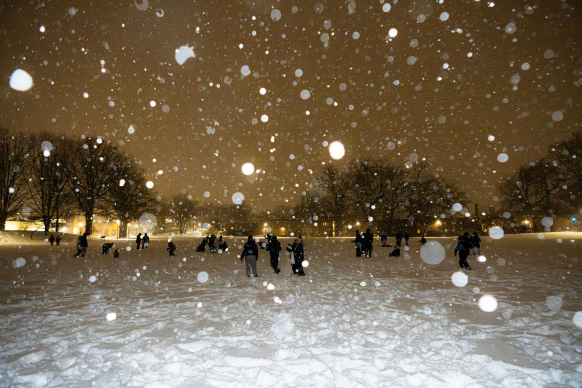 Kent students gather at the bottom of the hill outside of Taylor Hall for a snowball fight on Sunday, Jan. 25, 2026.