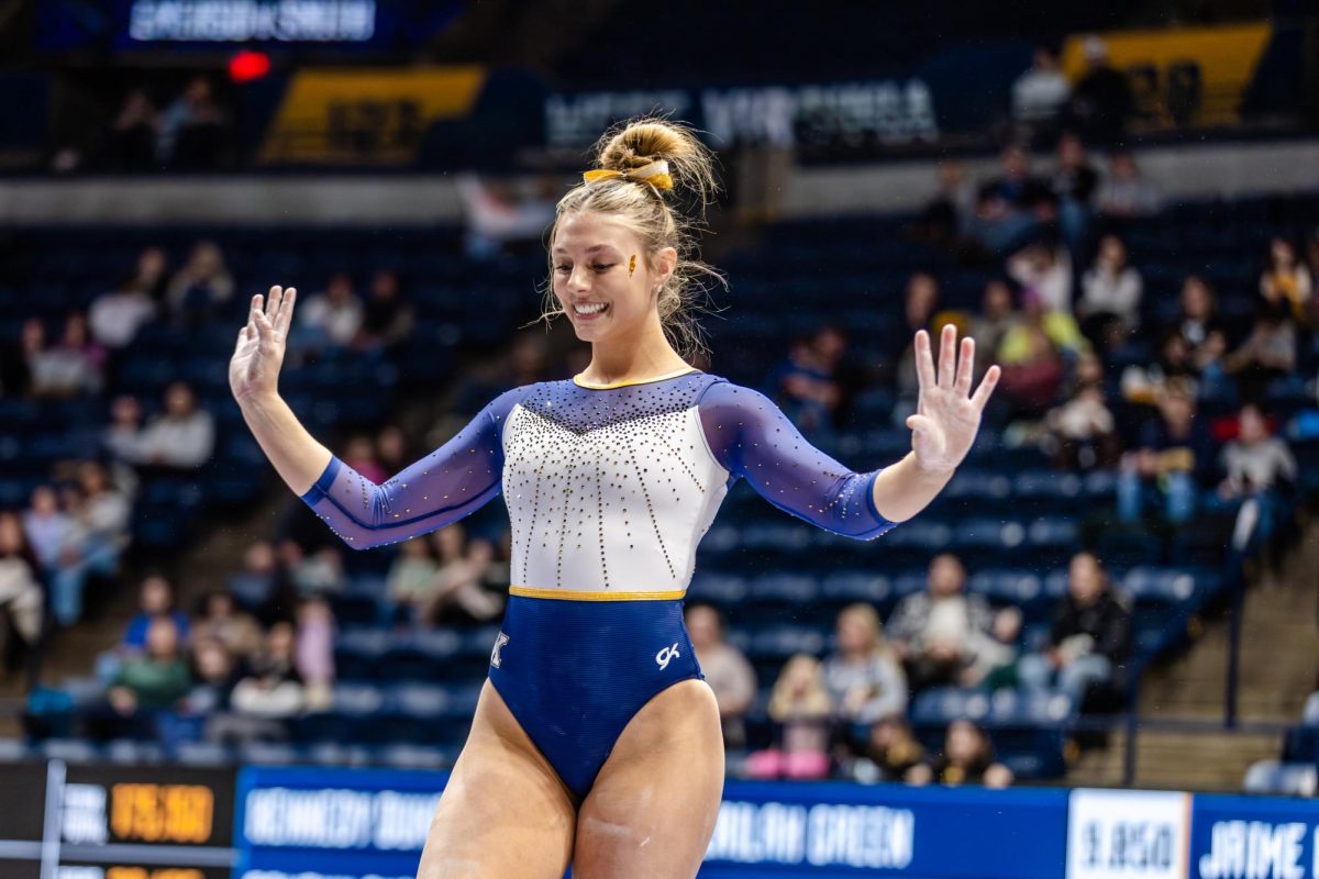 Kent junior Gabby Riley competes on the beam at the West Virginia meet on Friday Jan. 30, 2026.