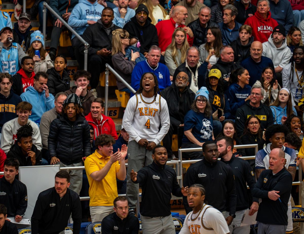 Kent redshirt junior Jamal Sumlin cheers on his team in the first half against Miami (OH) on Jan. 20, 2026.