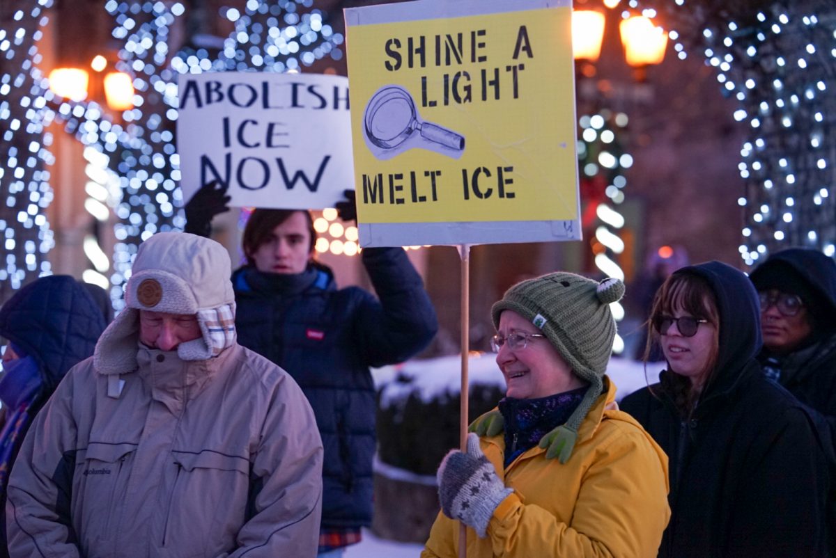 Members of the Kent community stand downtown with signs to protest against ICE's actions on Jan. 20, 2026.