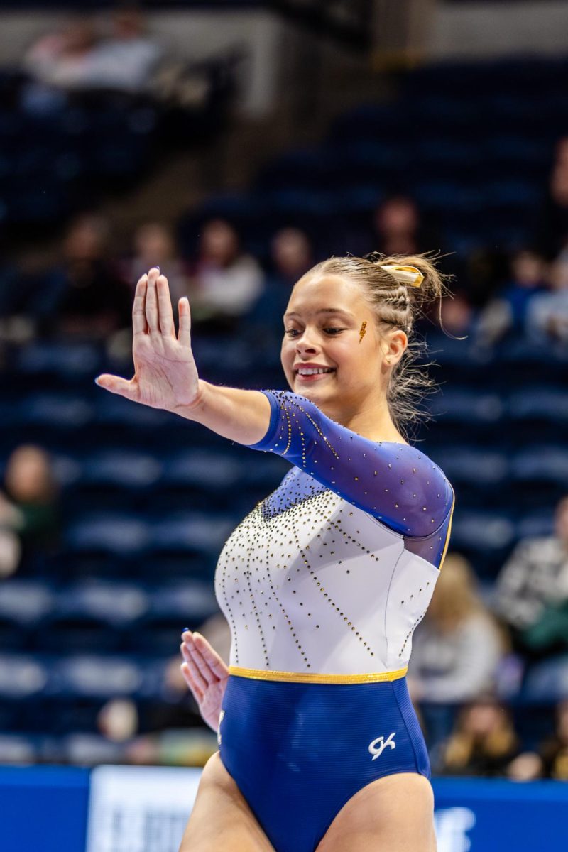Kent sophomore Anika Most competes on beam at the West Virginia meet on Friday Jan. 30, 2026.
