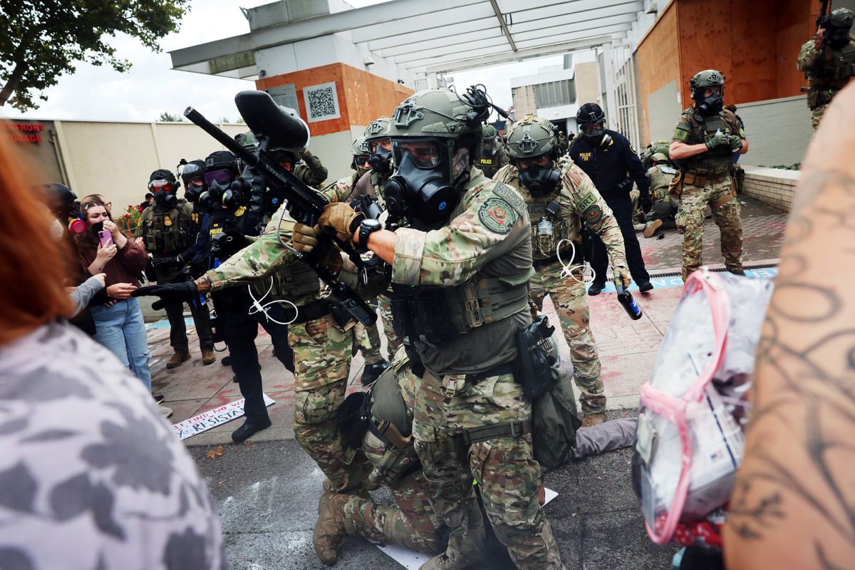 Federal agents, including Border Patrol officers, clash with protesters outside a US Immigration and Customs Enforcement facility in Portland, Oregon, on October 4, 2025.