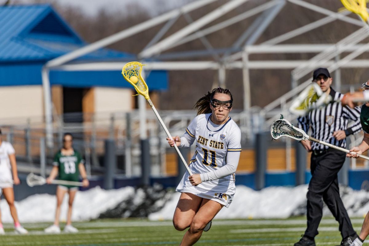 Kent senior Zayda Crumpton runs with the ball during their home opening match against Mercyhurst on Feb. 14, 2026.