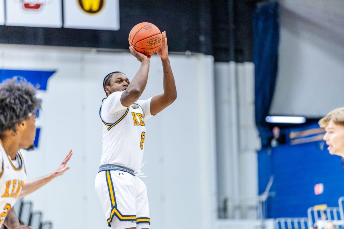 Kent graduate student Morgan Safford shoots a three pointer during the men's basketball game against Central Michigan University on Feb. 24, 2026.