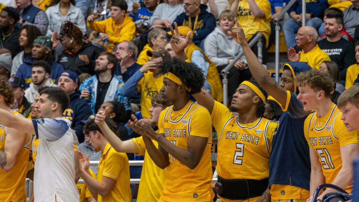 Kent basketball players celebrate on the bench after a play during the second half of their game against Akron on Feb. 27, 2026.