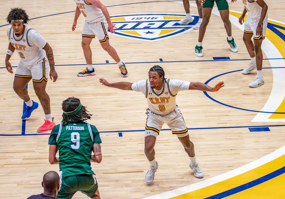 Kent graduate student Morgan Safford, right, defend Eastern Michigan player Addison Patterson in their game on Feb. 11, 2026.