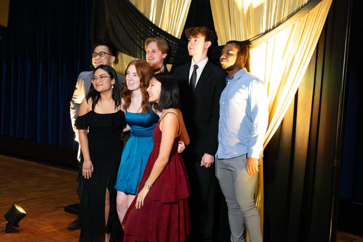 Kent students pose for a photo at the photobooth at FAB's Roaring 20s dance on Feb. 21, 2026.