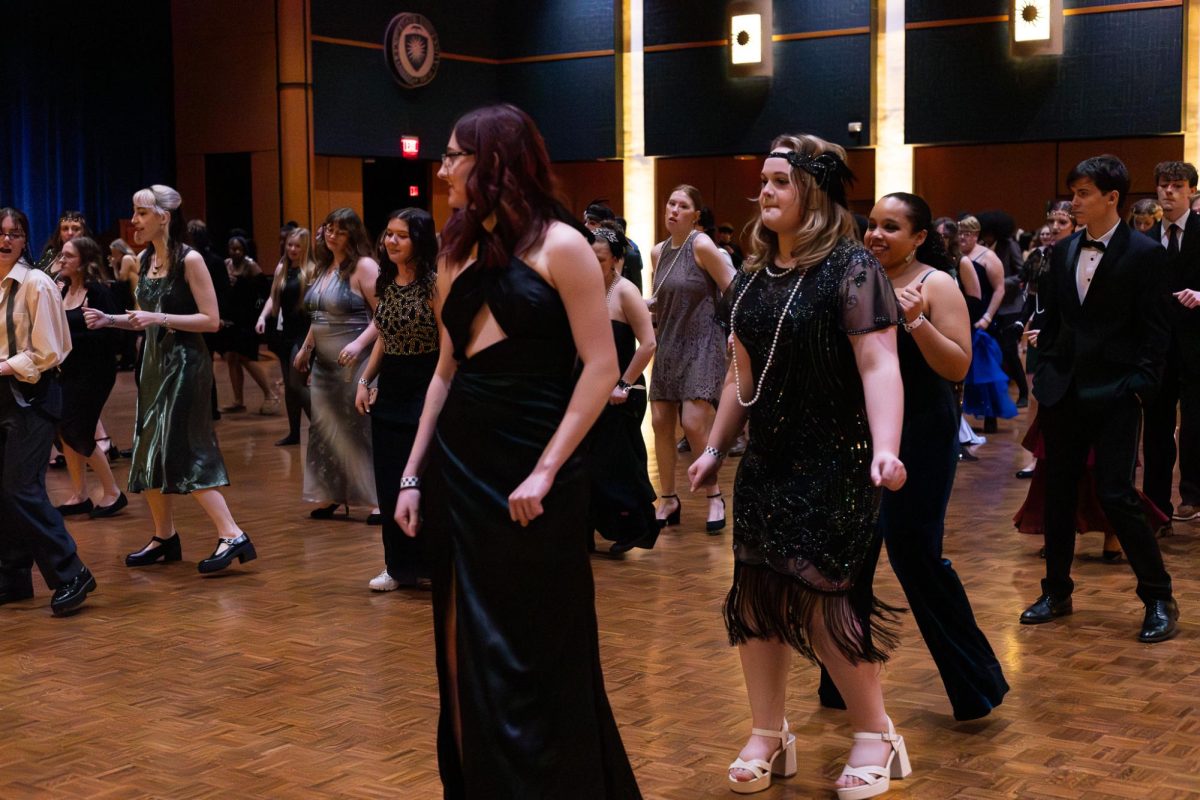 Kent students dance to the Cupid Shuffle at FAB's roaring '20s formal on Feb. 21, 2026. 