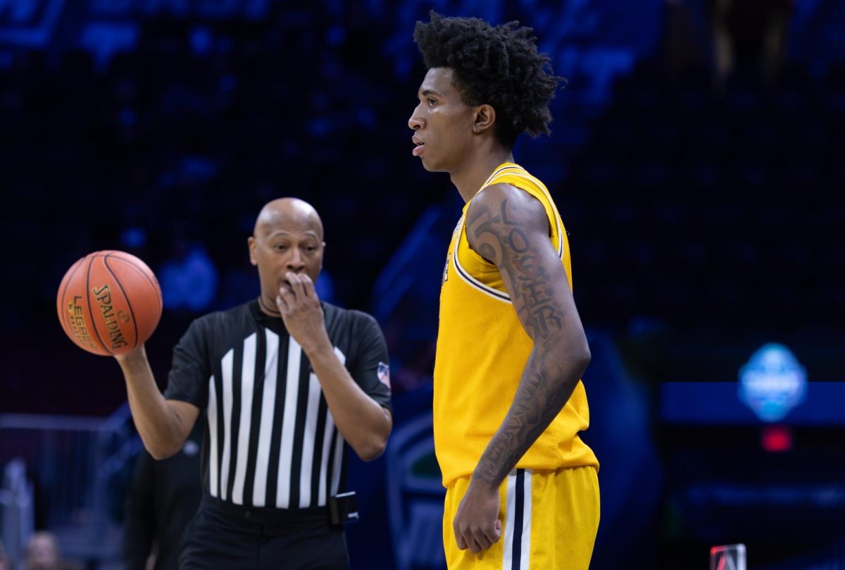 Kent redshirt sophomore Rayvon Griffith prepares to inbound the ball after Kent gains possession in the second half of the first round of the Mid-American Conference Tournament on March 12, 2026.