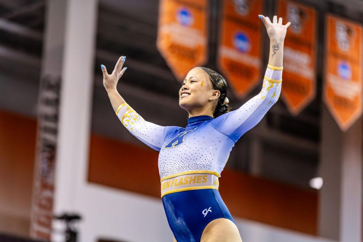 Kent junior Nene Alvine competes on the beam at the gymnastics MAC tournament in Bowling Green on March 22, 2026. 