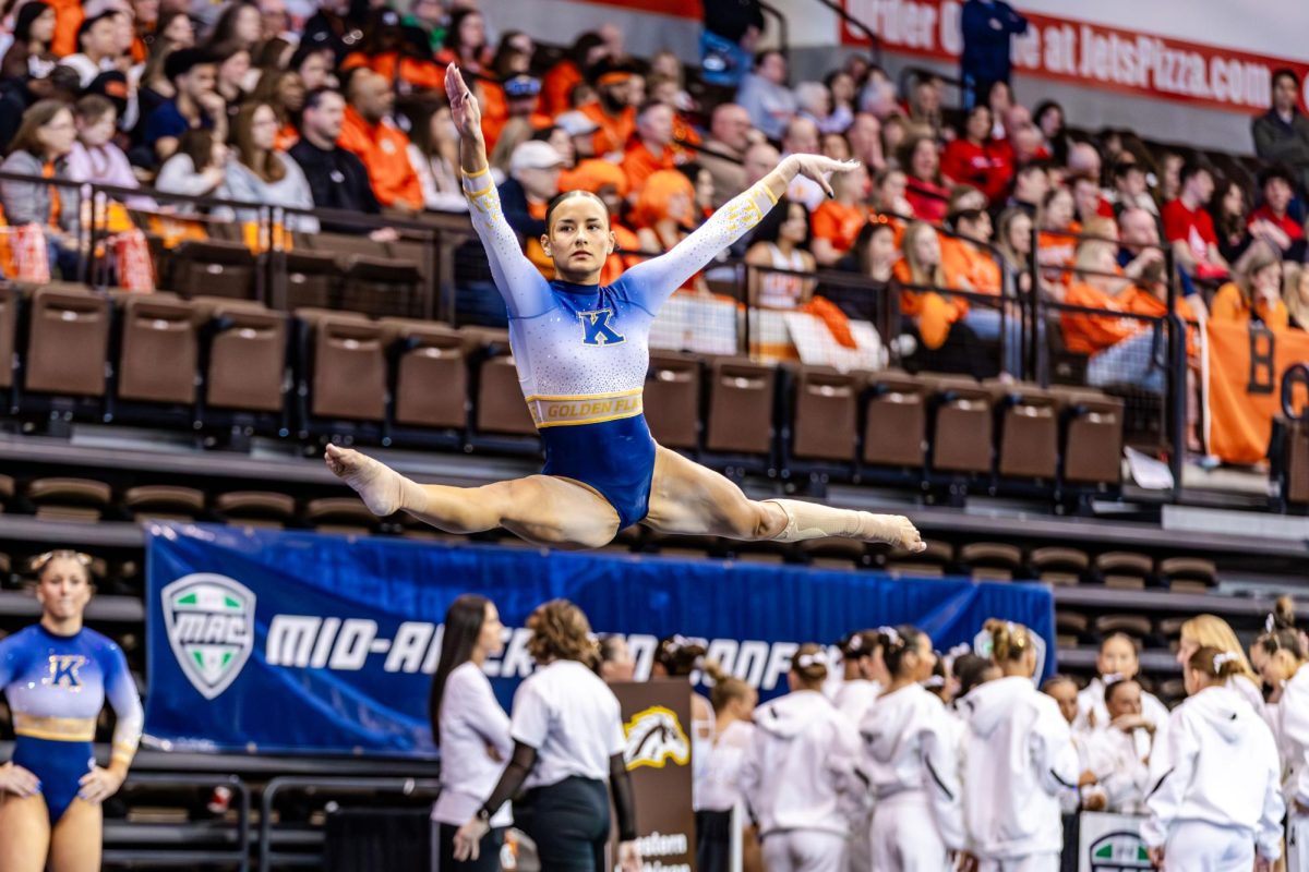 Kent senior Charlie Behner performs her floor routine at the gymnastics MAC tournament in Bowling Green on March 22, 2026. 