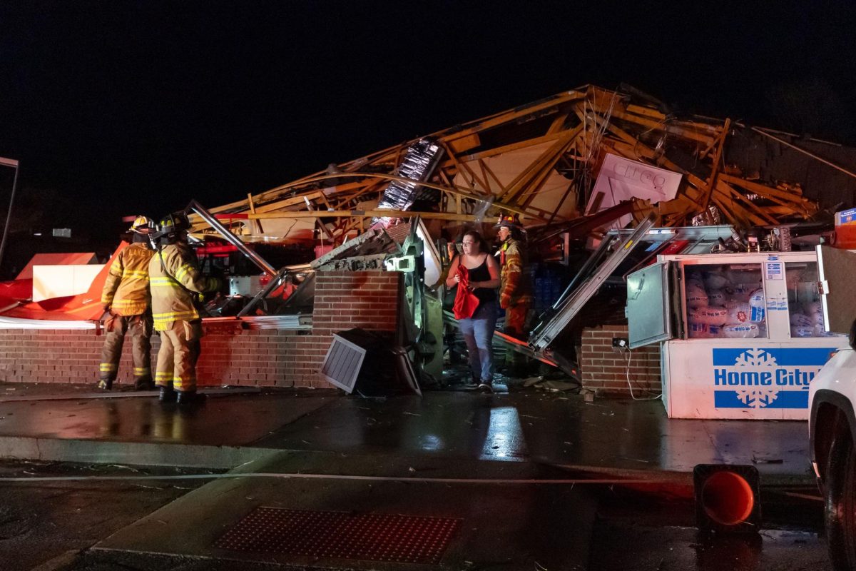 An employee emerges from the rubble of a Family Dollar destroyed by a tornado in Lake Village, Indiana, on March 10. Michael Hickey/Getty Images via CNN Newsource