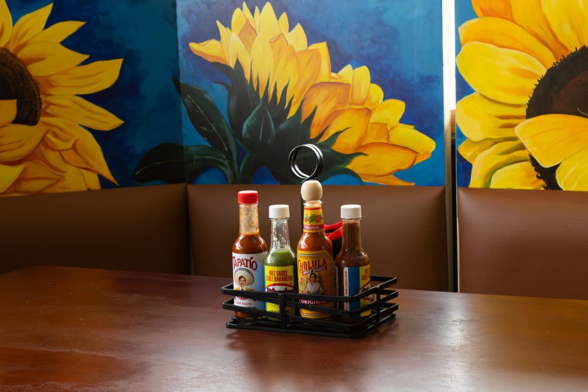 Variety of hot sauce options at Los Girasoles.