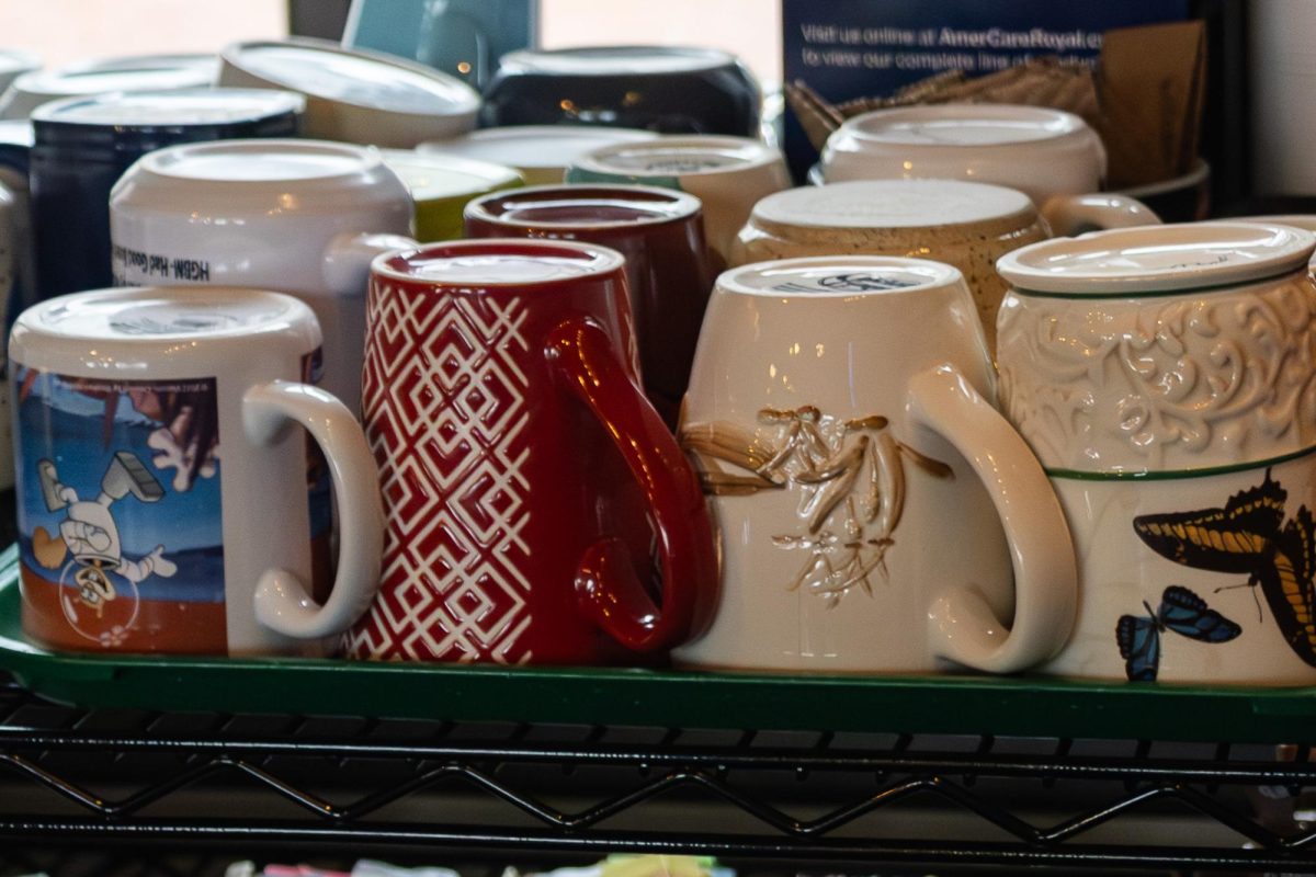 Coffee mugs that customers get to use at Over Easy at the Depot in downtown Kent.