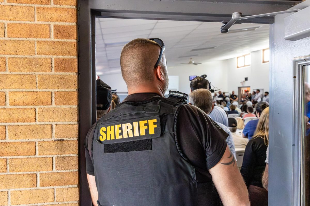 The Sheriff blocks the door due to the maxed capacity at the Shalersville Town Hall meeting on June 16, 2026.